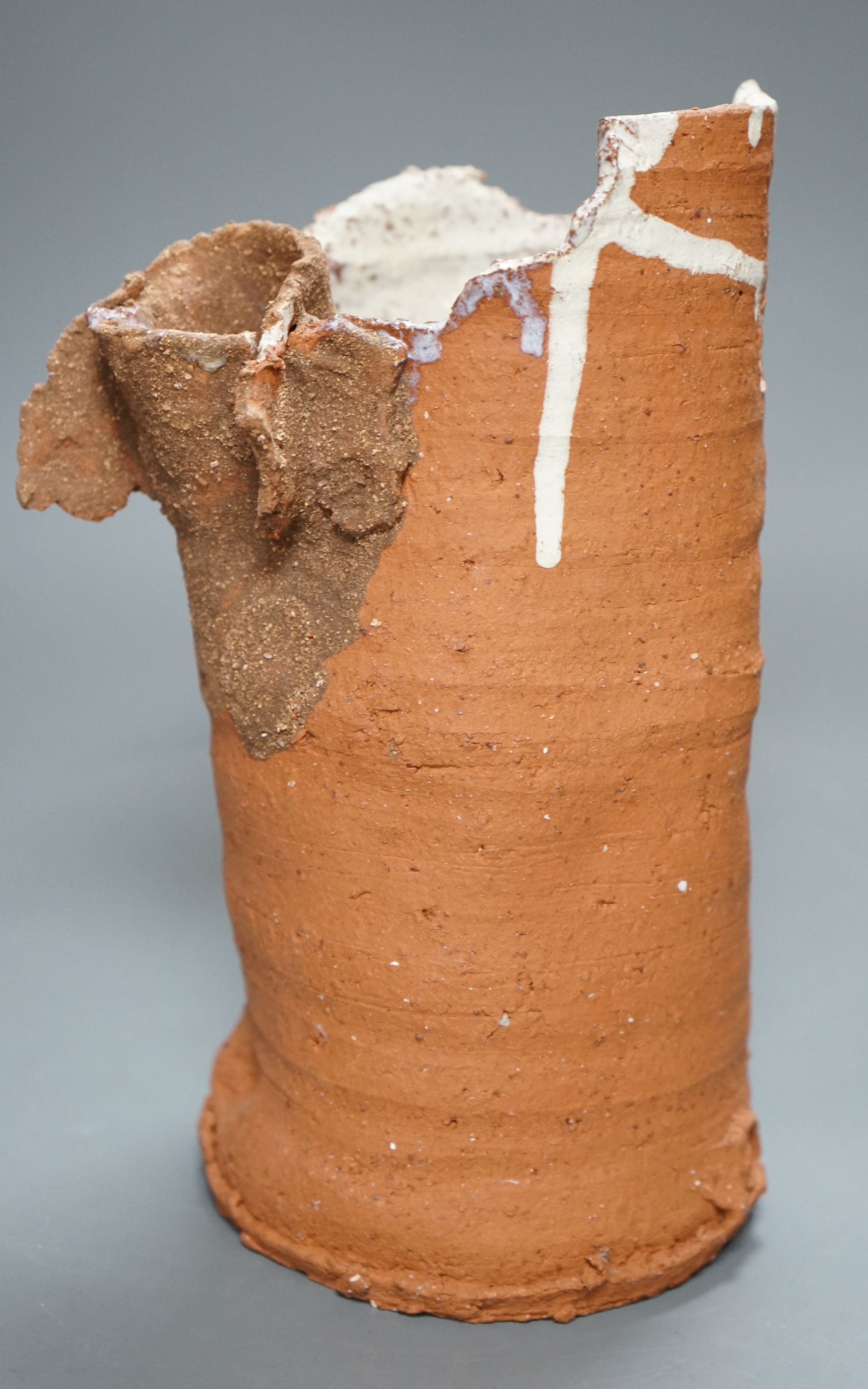 Peter Smith, a thrown terracotta cylindrical vessel with white glaze to the interior and brown nose vessel, with original purchase receipt, impressed mark to base rim, 26.5cm tall